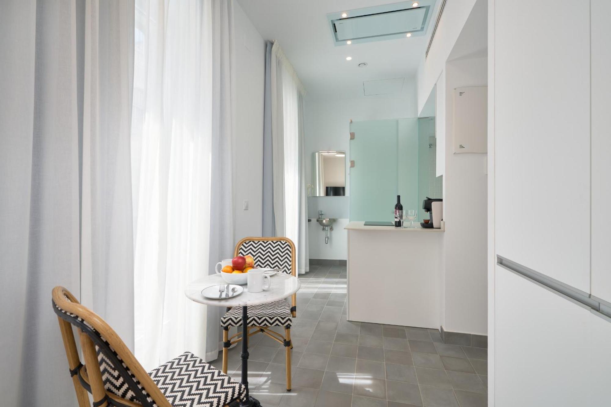 Aparthotel Naranjas Y Limones, By Homing U Sevilla Habitación foto